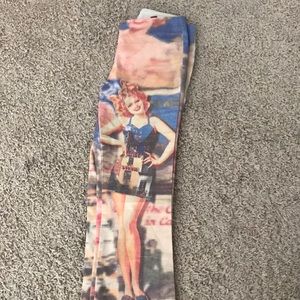 Boutique pants w/ beautiful print fine quality, very retro but sits elegantly!